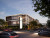 Burnside Hospital, a modern multi-story building, stands well-lit at dusk with nearby cars and pedestrians. Lush greenery surrounds it.